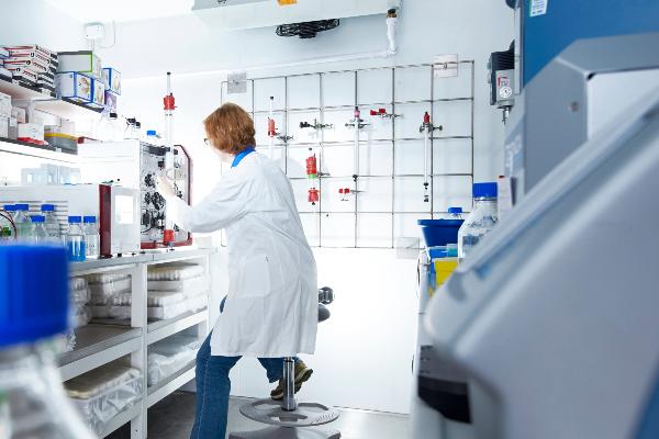Researcher purifying proteins in a cold room