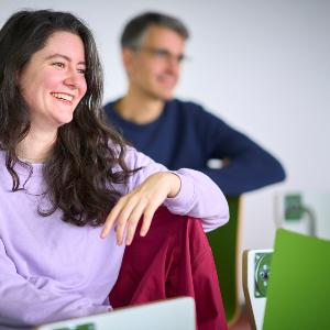 Two employees during a meeting
