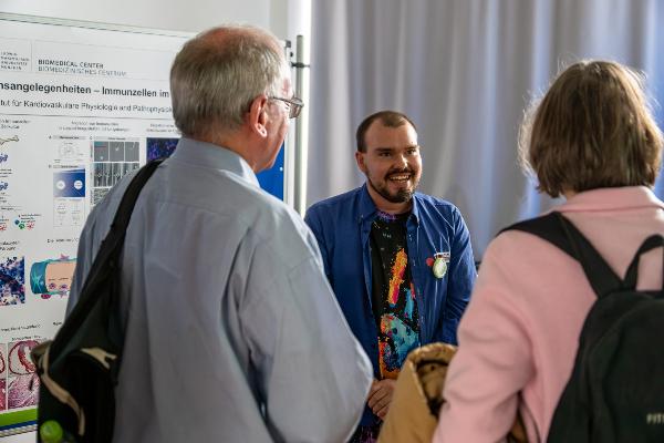 Visitors at an interactive information booth
