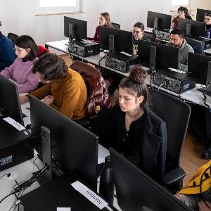 Students in class, working on computers
