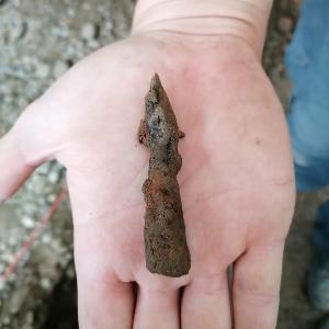A rusted projectile point from Roman times.