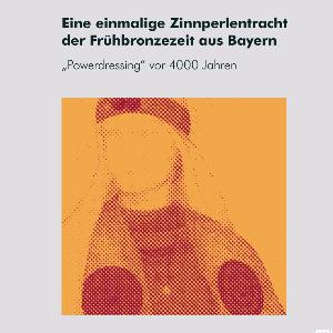 Buchumschlag des Buchs über ein Grab mit außergewöhnlicher Zinnperlentracht