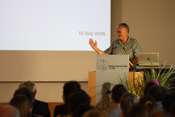 Wolfram Mauser giving speech.