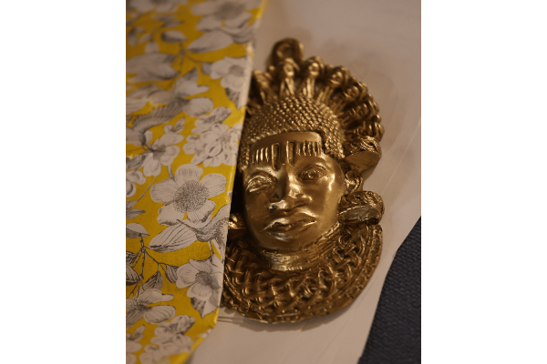 A replica of the bronze bust of wise Queen Idia of the ancient Benin Kingdom.