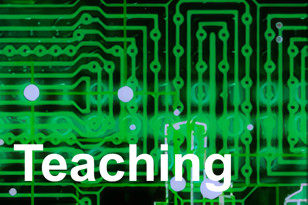 The word Teaching in white superimposed on a black and green background