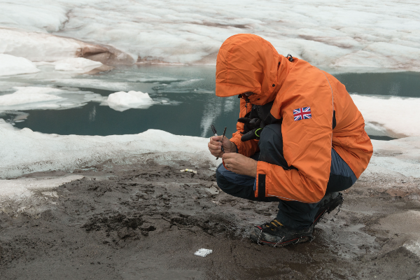 William Orsi takes mud samples