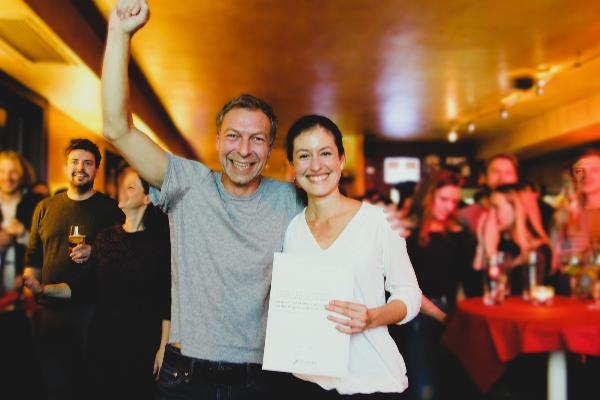 Two winners celebrating their CeNS publication award