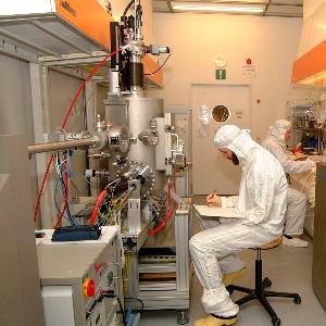Researchers working in a clean room facility | © CeNS Researchers working in a clean room facility