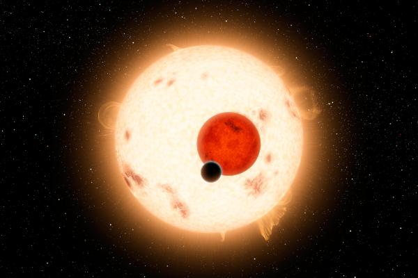 Artist´s impression of exoplanet Kepler 16 b. This planet orbits a pair of stars, both are smaller and lighter than our Sun but one significantly smaller than the other. The planet is of a gaseous nature and slightly smaller than Saturn.