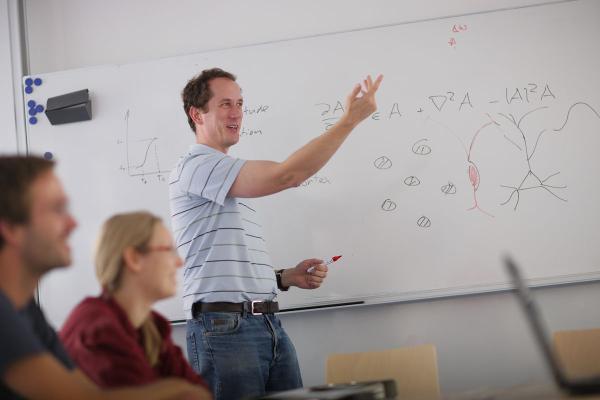Course instructor with students