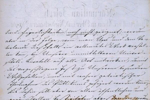 Foto eines handgeschriebenen Textes auf weißen Papier