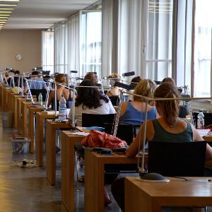 Students in the work area in the library