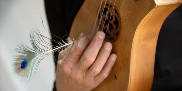 Citole of Joel Frederiksen, played with a peacock feather