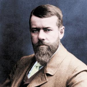 Koloriertes Porträt Max Webers mit kurzem Haar im braunen Anzug und grüner Krawatte vor dunklem Hintergrund.