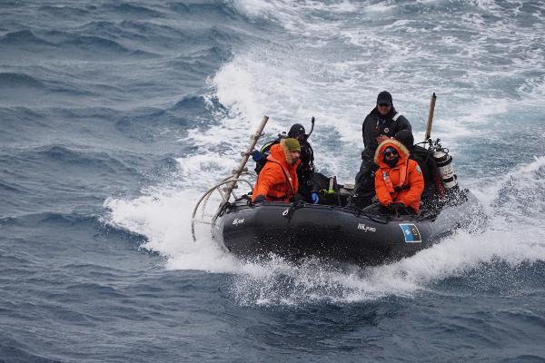 On a motorboat in the Antarctic