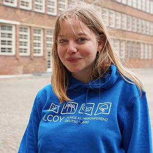 LMU medical student Lucia in a blue LCOY jumper