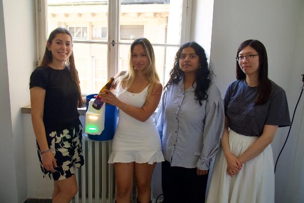 LMU Students with a Prototype of an Interactive Bottle-Collection Station