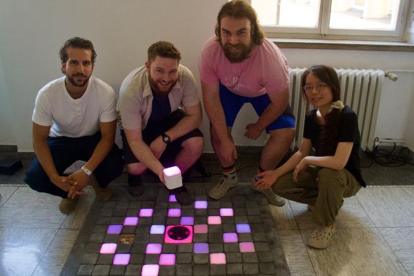 Four students showcase their prototype: Glowing stones for navigation