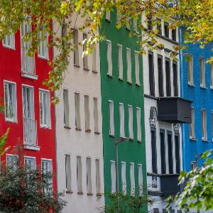 Street with colorful multi-story apartment buildings