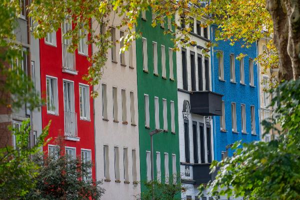 Street with colorful multi-story apartment buildings