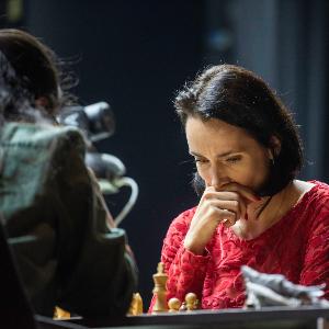 Two women playing chess