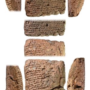 Clay tablet with cuneiform signs