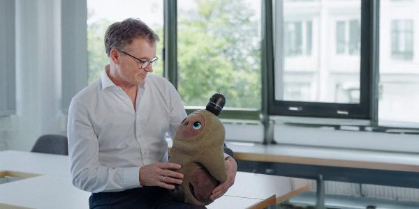 Prof. Dr. Peter Zentel with the robot Marie