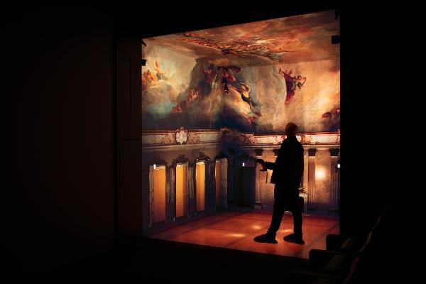 Eine Person steht in einer 3D-Simulation eines barocken Raumes